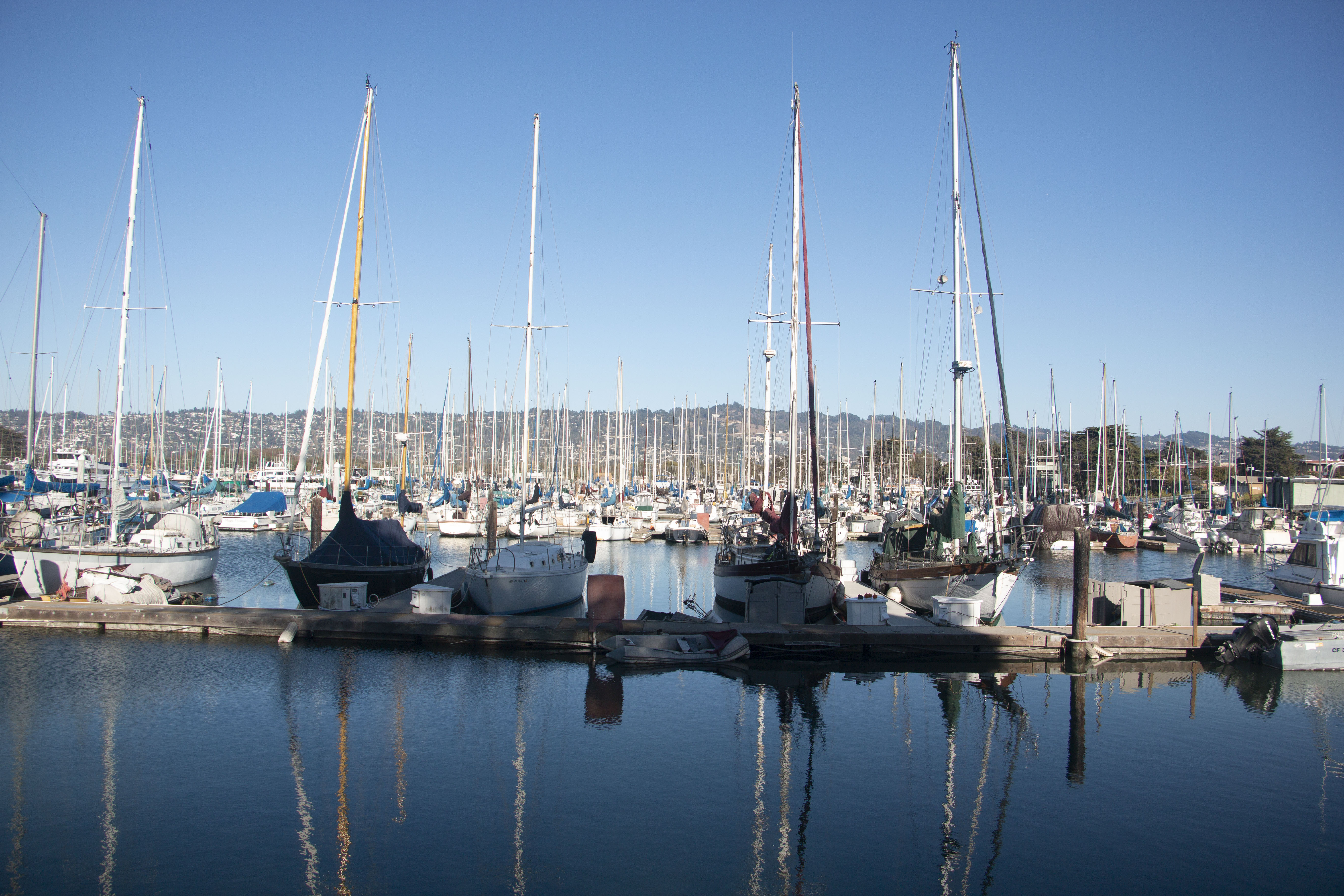 Boats are parked at the dock.